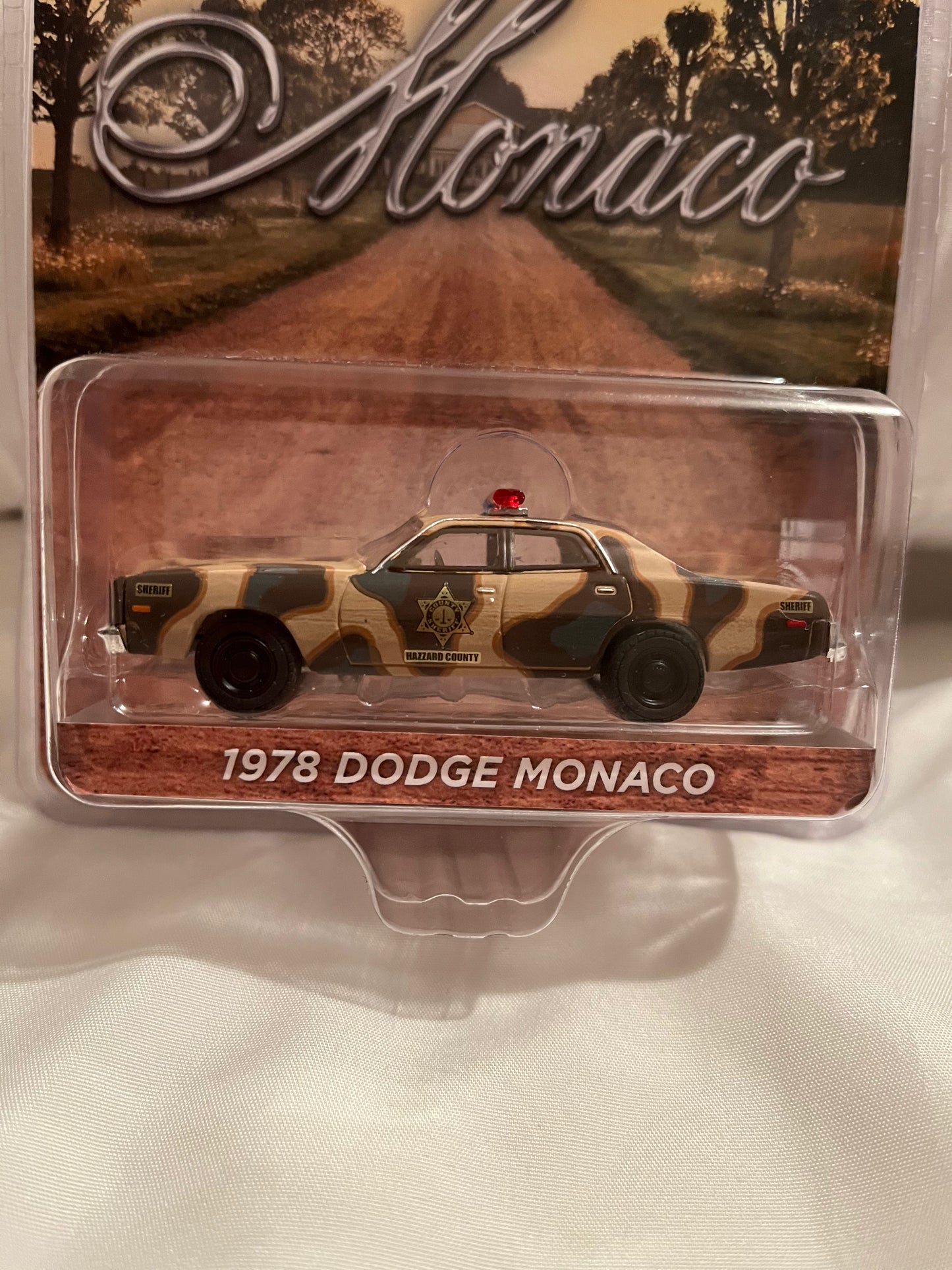 1:64 CAMOUFLAGE 1978 DODGE MONACO HAZZARD COUNTY SHERIFF *RETIRED*